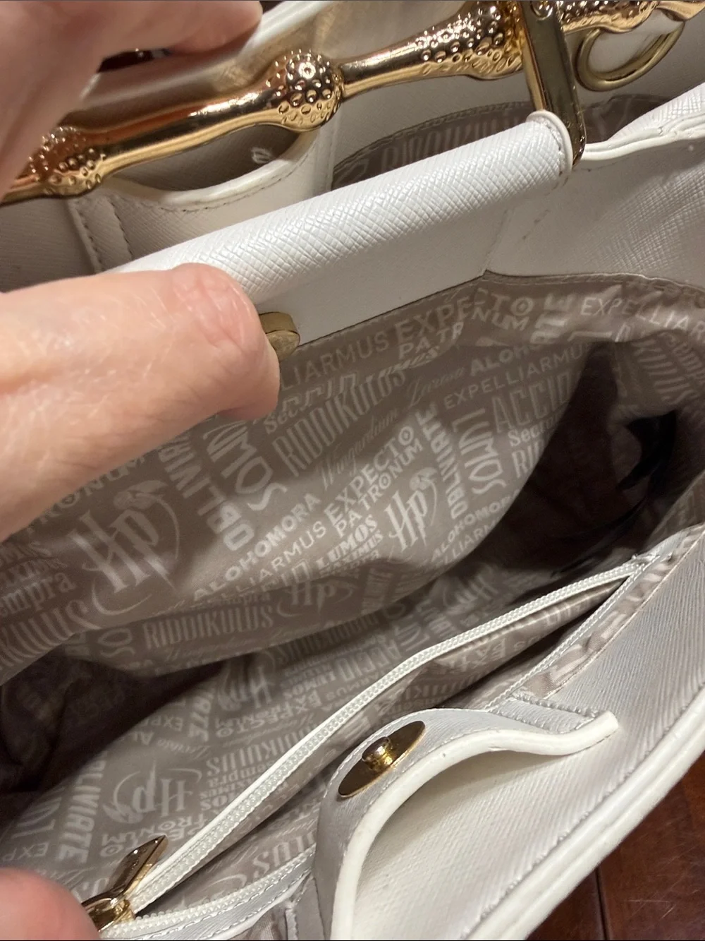 Loungefly Harry Potter White/Ivory Deathly Hallows Wand Handle Bag